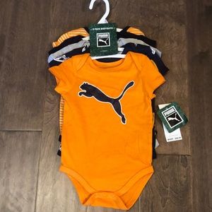 NWT Puma onesies (5)